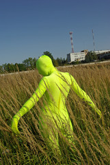ufo alien strange faceless creature on the field