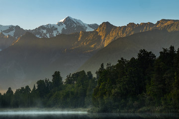 Lake Matheson. Locate near the Fox Glacier in West Coast of South Island of New Zealand.It is famous for its reflected views of Aoraki/Mount Cook and Mount Tasman.