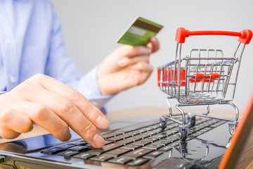 A woman using credit cart on the online shopping  