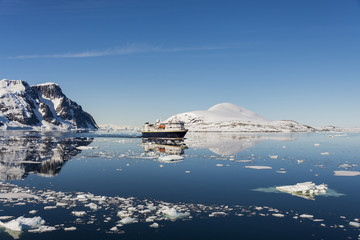Antarctic landscape with ship © Alexey Seafarer