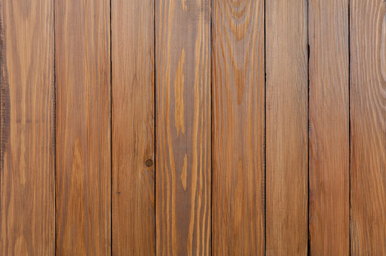 Golden brown wooden texture. Striped background.