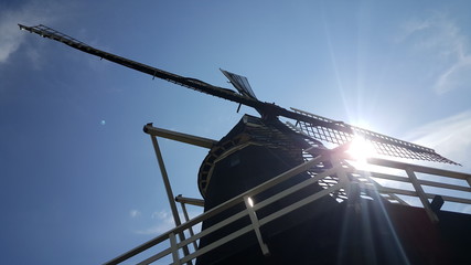 Dutch windmill with lens flare