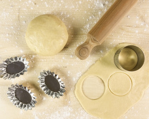Shortcrust pastry on wooden background - top view