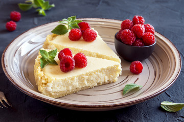 cheesecake with fresh raspberries - obrazy, fototapety, plakaty