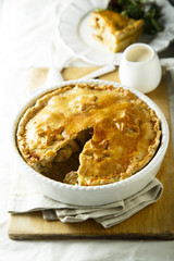 Savory pie with chicken and mustard sauce