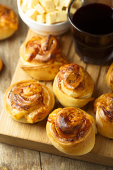 Homemade cheese buns with tomato sauce and herbs