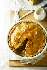 Savory pie with chicken and mustard sauce