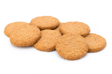 Stacked short pastry cookies isolated on white background.