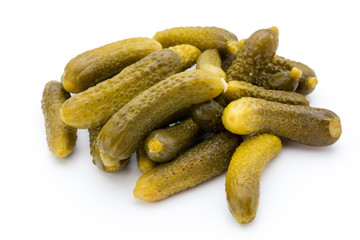Marinated pickled cucumbers isolated on the white.
