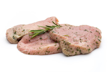 Steak with spices isolated on white background.