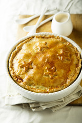 Savory pie with chicken and mustard sauce