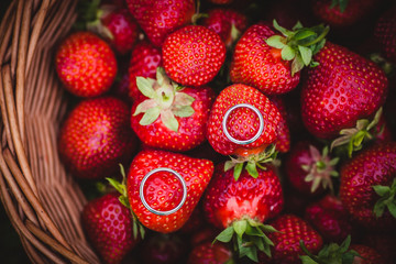 wedding rings on the strawberries