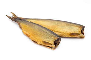 Smoked trout in front of a white background.