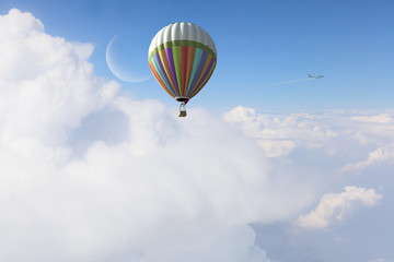 Aerostat flying above clouds