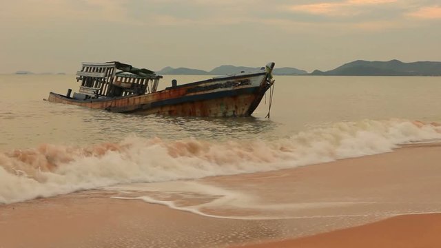 wreck boat on sea beach