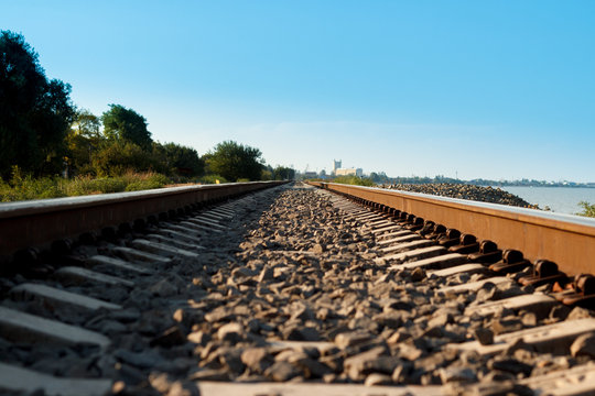 Railroad going to the distance near the shore