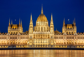 Fototapeta na wymiar Night view of the Hungarian Parliament Building on the bank of the Danube in Budapest, Hungary