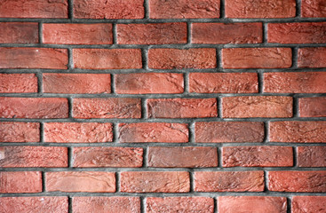 red brick wall texture grunge background with vignetted corners