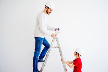 Father and son working together