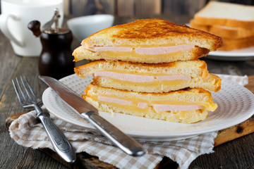 French toast  cheese and bacon with  on a  old wooden background. Selective focus.