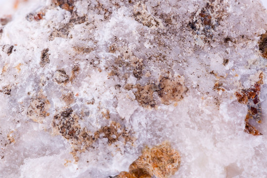macro mineral calcite stone on a white background