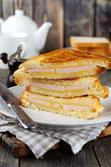 French toast  cheese and bacon with  on a  old wooden background. Selective focus.