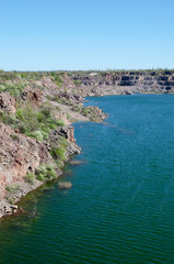 Fototapeta na wymiar lake on the site of an old quarry