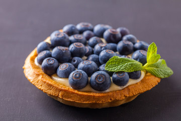 Tartlets with custard and blueberries