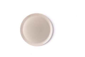 Flat round gray plate on a white background