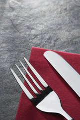knife and fork on napkin