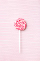 Lollipops sweets. Candy, top view flat lay on pink background. Sweet sucker, lollipop, candy, isolated minimal concept above decoration, food background