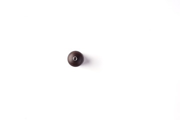 salt/pepper wooden mill on a white background top view