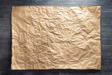 sheet of paper at wooden background