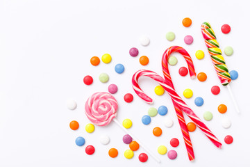 Lollipops sweets. Candy, top view flat lay on white background. Sweet sucker, lollipop, candy, isolated minimal concept above decoration, food background
