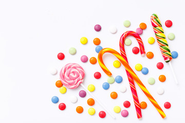 Lollipops sweets. Candy, top view flat lay on white background. Sweet sucker, lollipop, candy, isolated minimal concept above decoration, food background