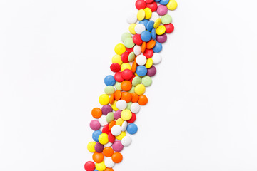Lollipops sweets. Candy mm, top view flat lay on white background. Sweet sucker, lollipop, candy, isolated minimal concept above decoration, food background