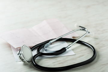 medicine  stethoscope and electrocardiogram,