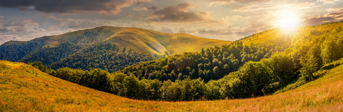 hillside panorama in mountains at sunset