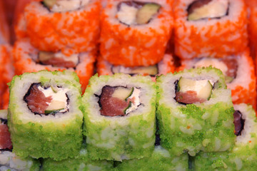 Roll with Cream Cheese and cucumber inside. Cavier topped