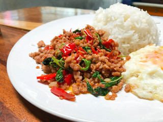 Rice topped with stir-fried pork and basil