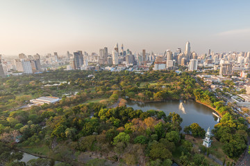 Scenic view of Lumpini (Lumphini) Park and Bangkok city in Thailand from above. © tuomaslehtinen