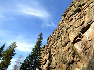 The rocks and the sky is blue