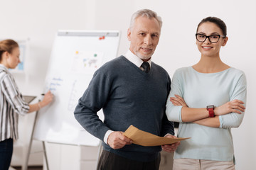 Fototapeta premium Two colleagues posing together on camera