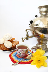 Samovar and cup on a light background