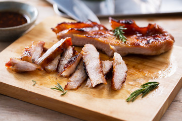 tasty slice grilled pork on wooden board,thai food