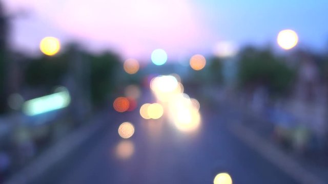 4K Bokeh of car lights. On the street at night Colorful Circles Video Background Loop Glassy circular shapes perform a colorful dance. motion background that is just perfectly suited for DVDs, events