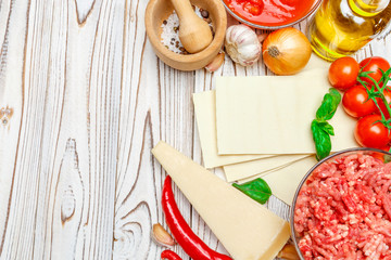 dried uncooked lasagna pasta sheets and vegetables