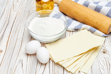 dried uncooked lasagna pasta sheets and ingridients