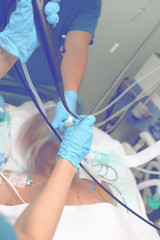 Comatose patient in the intensive care unit