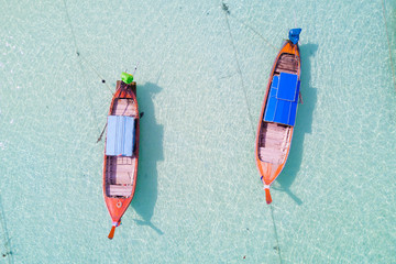 Aerial view over group of long tail boats,Top view from drone, Koh Lipe island, Satun,Thailand